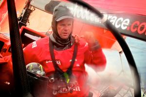Skipper Chris Nicholson on deck for sail change